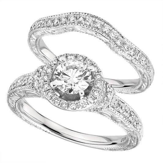 Lady's 14 Karat White Gold 1.25twt with 0.50ct Round Center Diamond Contemporary Engagement Ring with Matching Band - Size 7