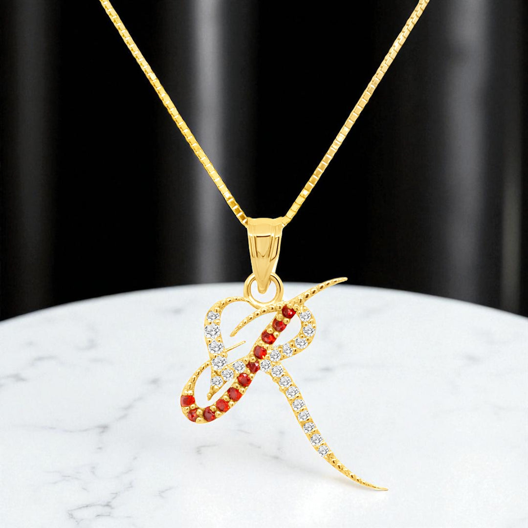 An image showing the final presentation of the 14K Initial Logo Pendant with Garnet & Natural Diamonds
