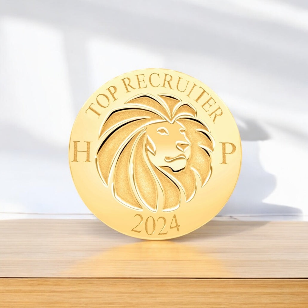 An image showing the final presentation of the 14 Karat Corporate Top Performer Pin