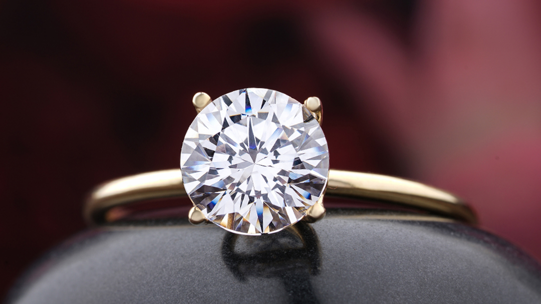 a image of a engagement ring with worn out, shifted prongs