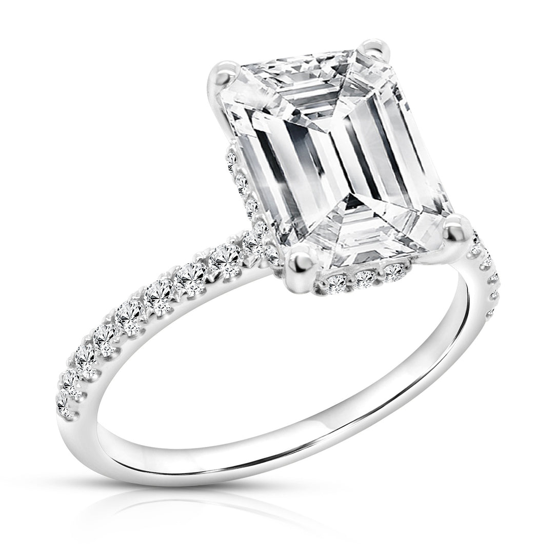 14 karat white gold 3.5ct emerald cut lab-grown diamond hidden halo engagement ring, angled three-quarter view