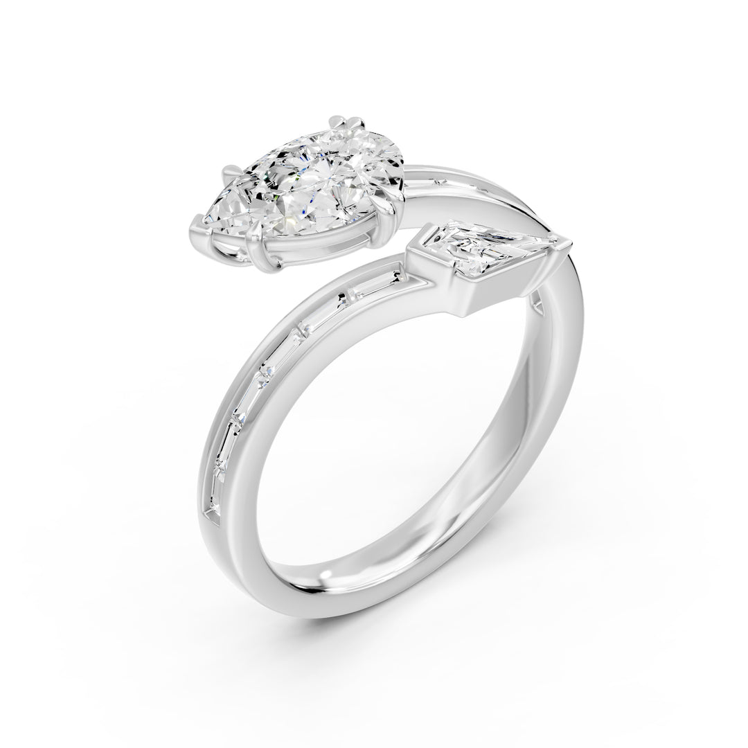 14K white gold bypass ring with pear lab-grown diamond and baguette accents