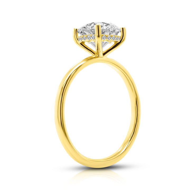 14 karat yellow gold 2ct round lab-grown diamond hidden halo engagement ring, side profile view showing the hidden halo
