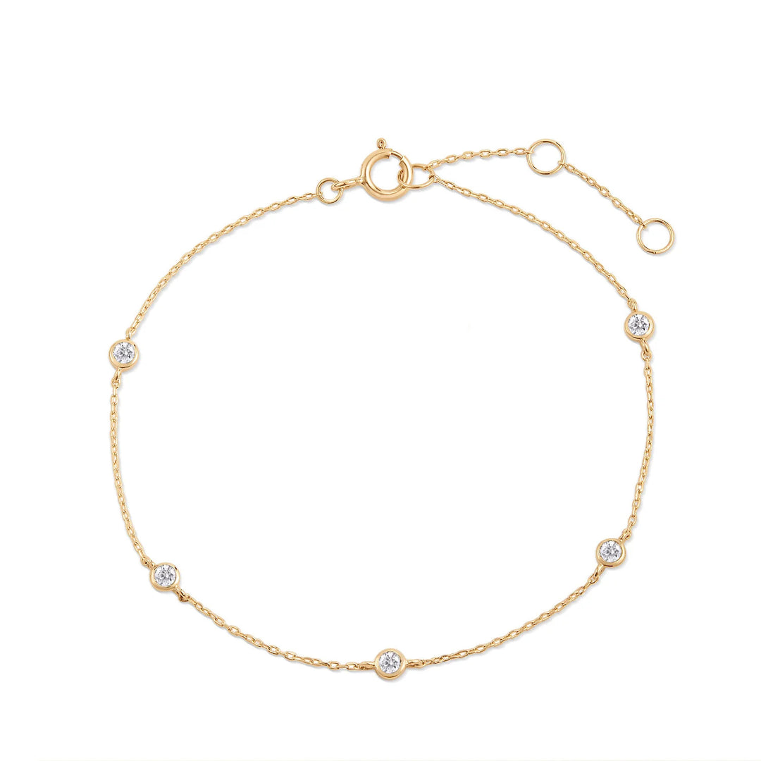14K yellow gold chain bracelet with five bezel-set round lab grown diamond stations
