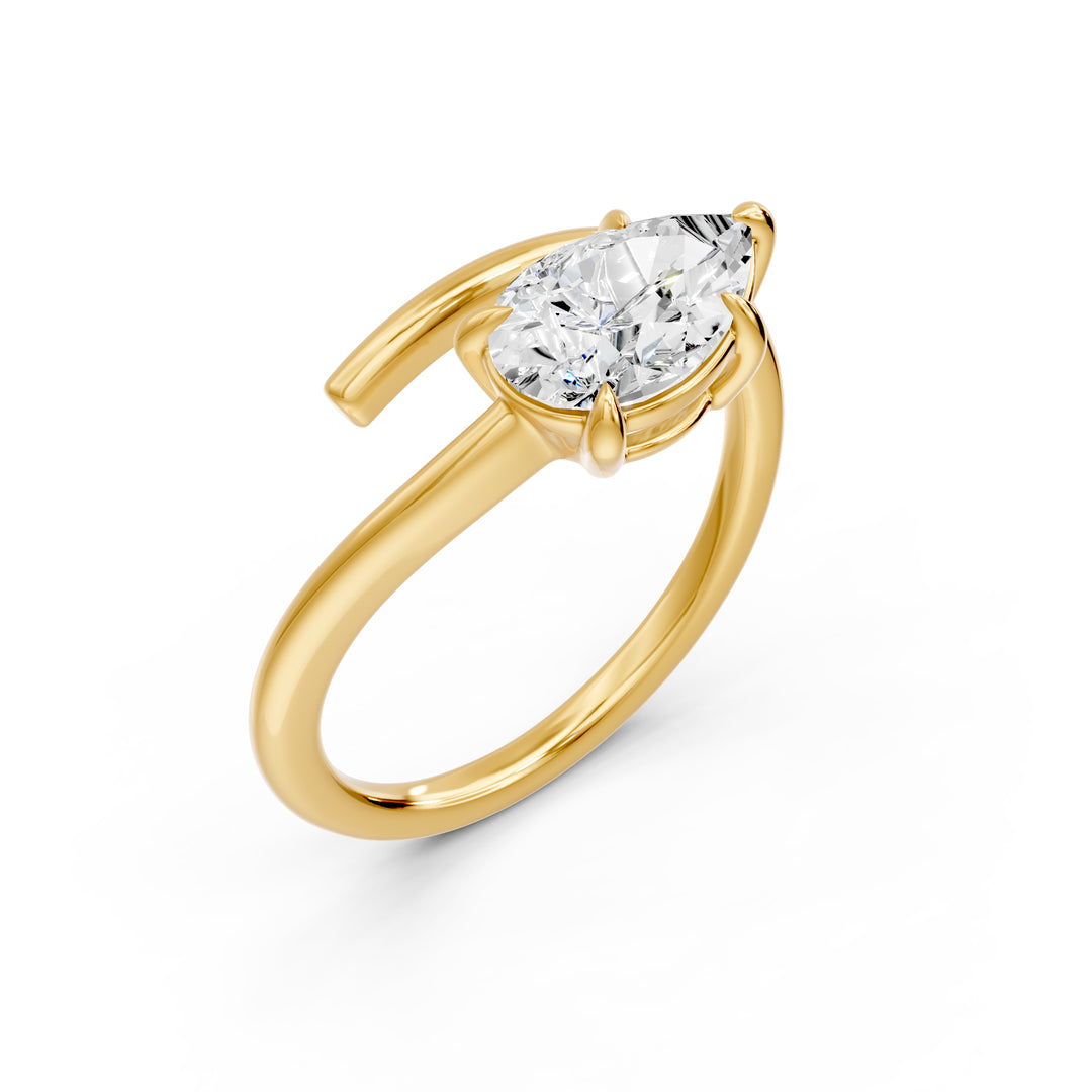 14K yellow gold bypass solitaire ring with 1.59 carat pear lab-grown diamond