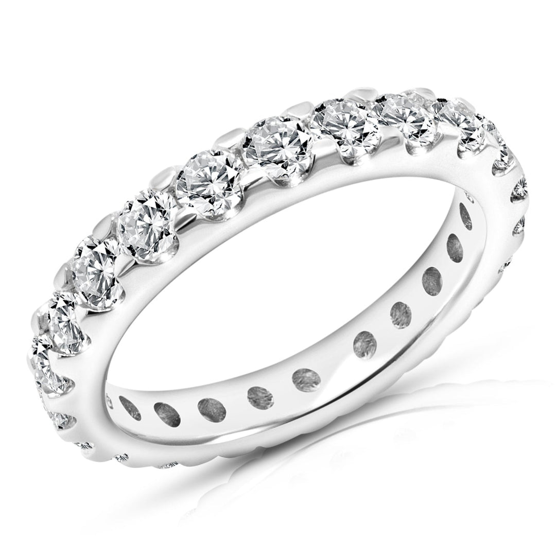 Angled view of the 14 karat white gold 1.5ct natural diamond eternity band showing the shared-prong round diamonds