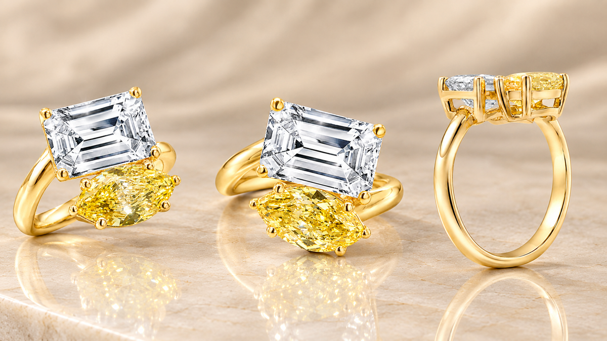 Three views of the 14 karat yellow gold two-stone lab grown diamond engagement ring with a fancy vivid yellow marquise and a white emerald cut, at AJ's Jewelry in Queens NY