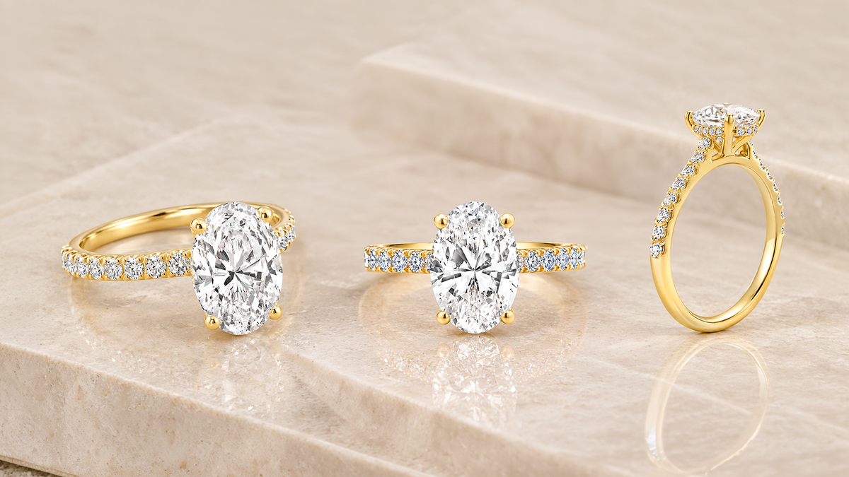 Three views of the 18 karat yellow gold oval lab grown diamond hidden halo engagement ring made at AJ's Jewelry in Queens NY