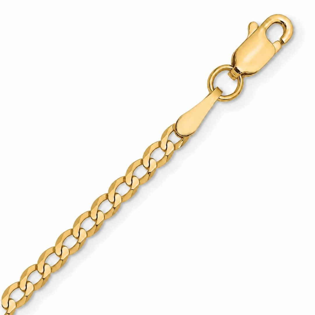 A close up of a yellow gold curb chain on a pure white background