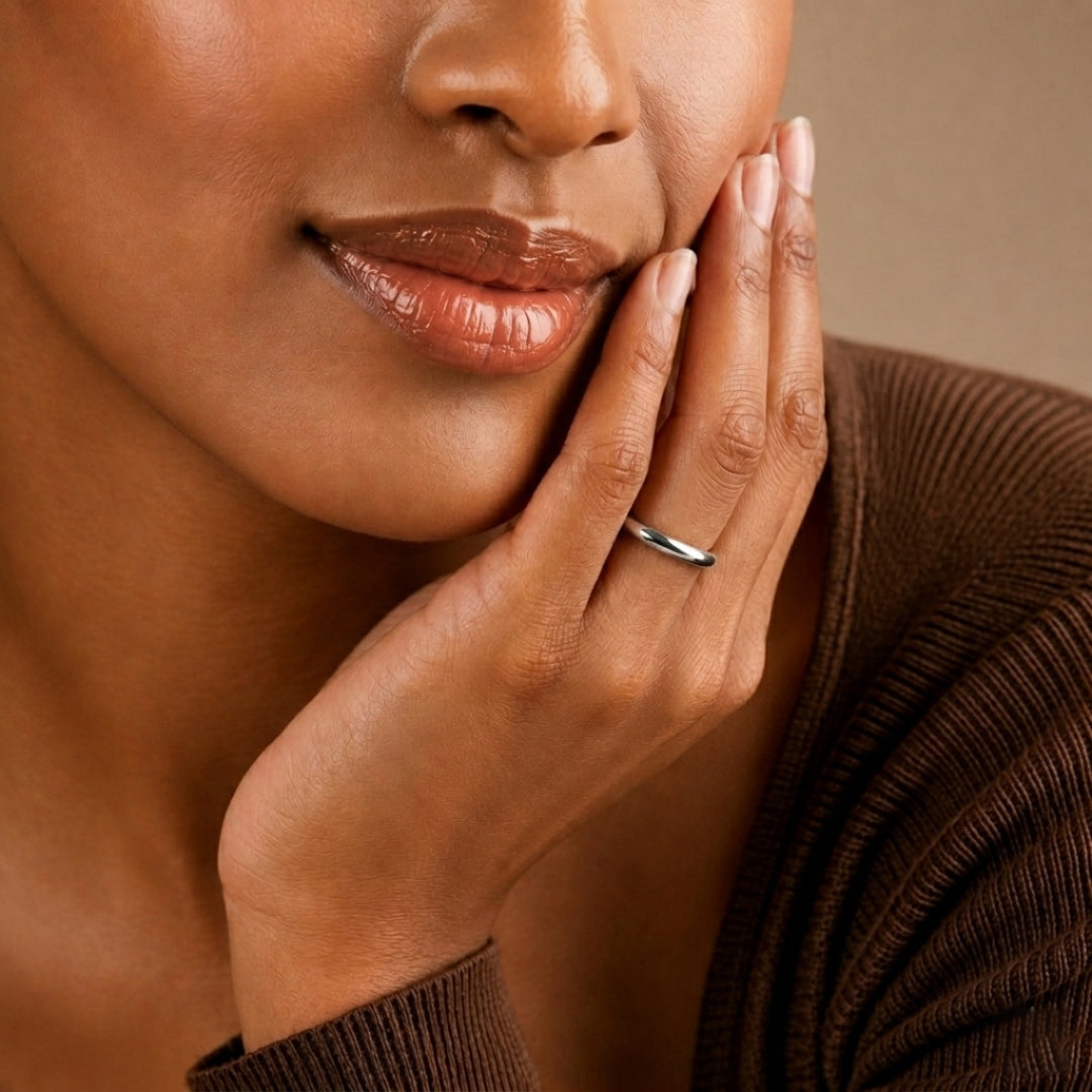 2mm sterling silver comfort fit wedding band worn on a model's hand, close-up view - AJ's Jewelry, Ridgewood NY