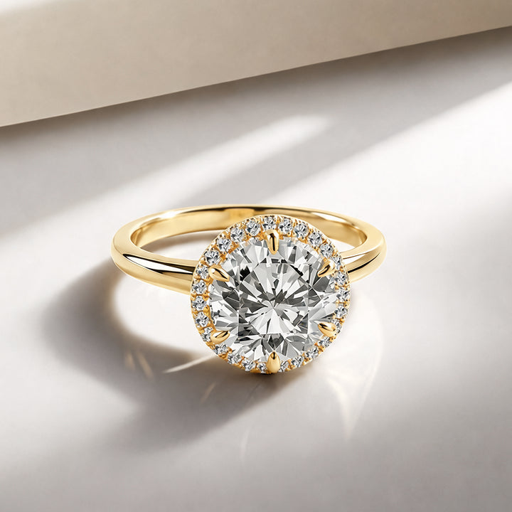 3ct round halo lab grown diamond engagement ring, front angle on a styled display - AJ's Jewelry Queens NY