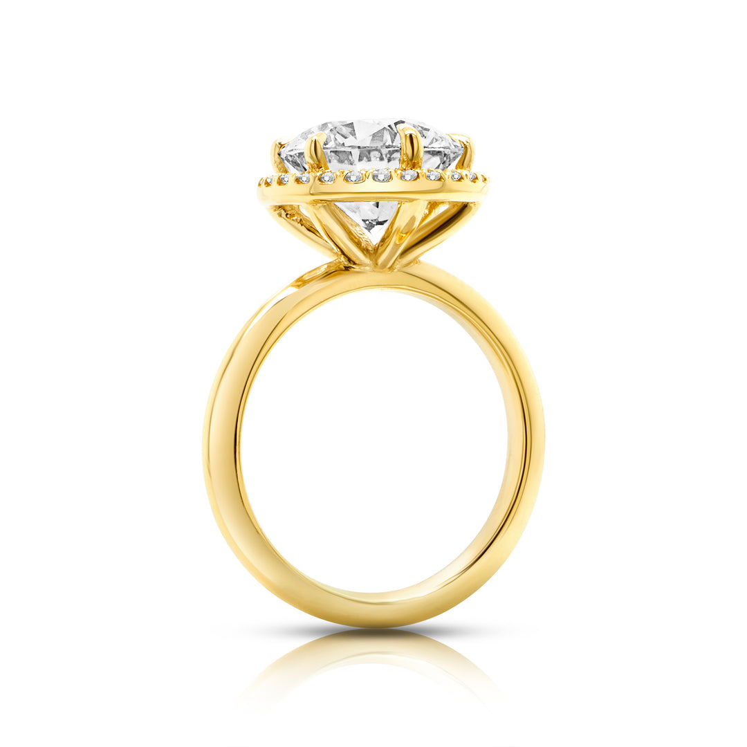 Side profile of a 3ct round halo lab grown diamond engagement ring showing the setting height in 14k yellow gold - AJ's Jewelry Queens NY