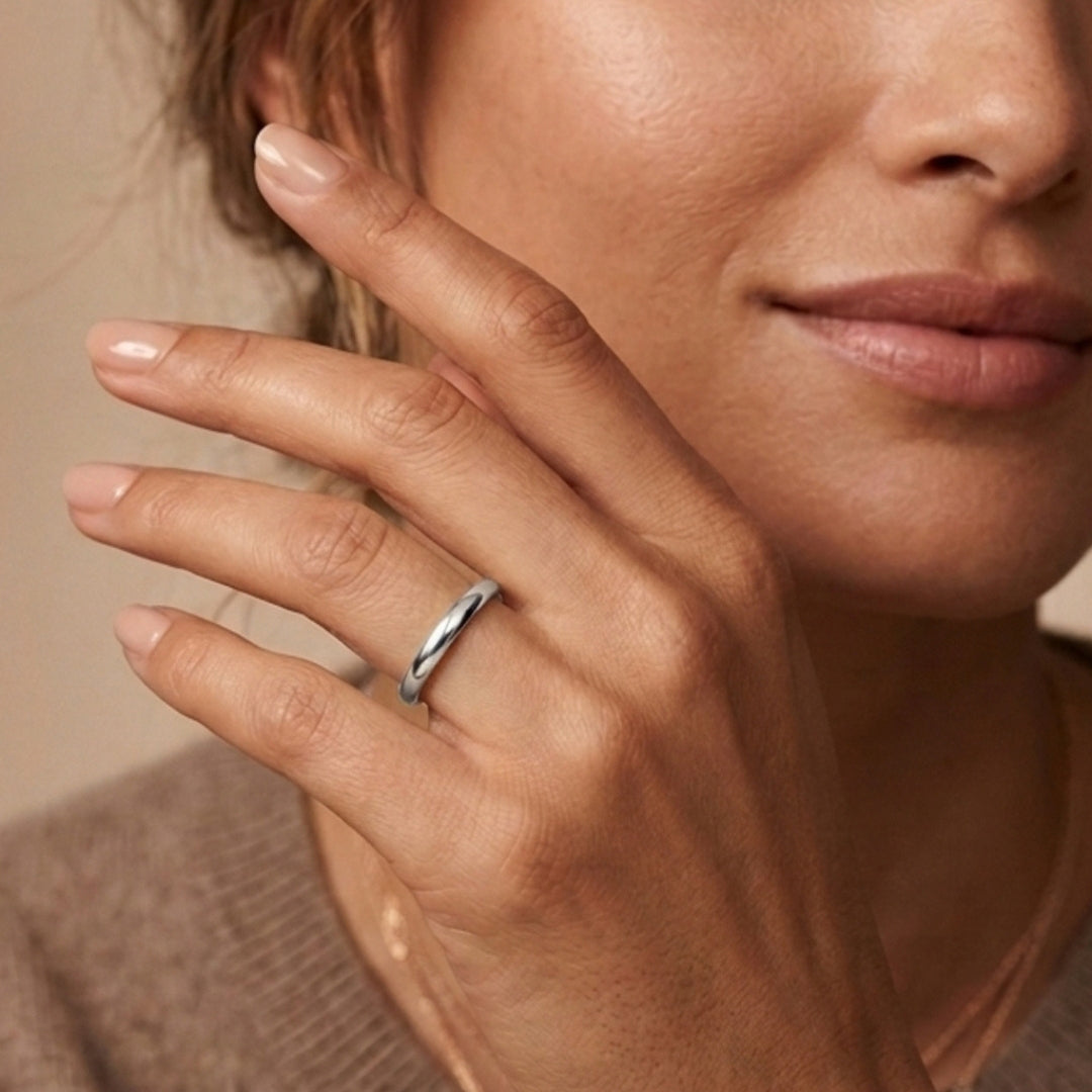 3mm 14K white gold comfort fit wedding band worn on a model's hand, close-up view - AJ's Jewelry, Ridgewood NY