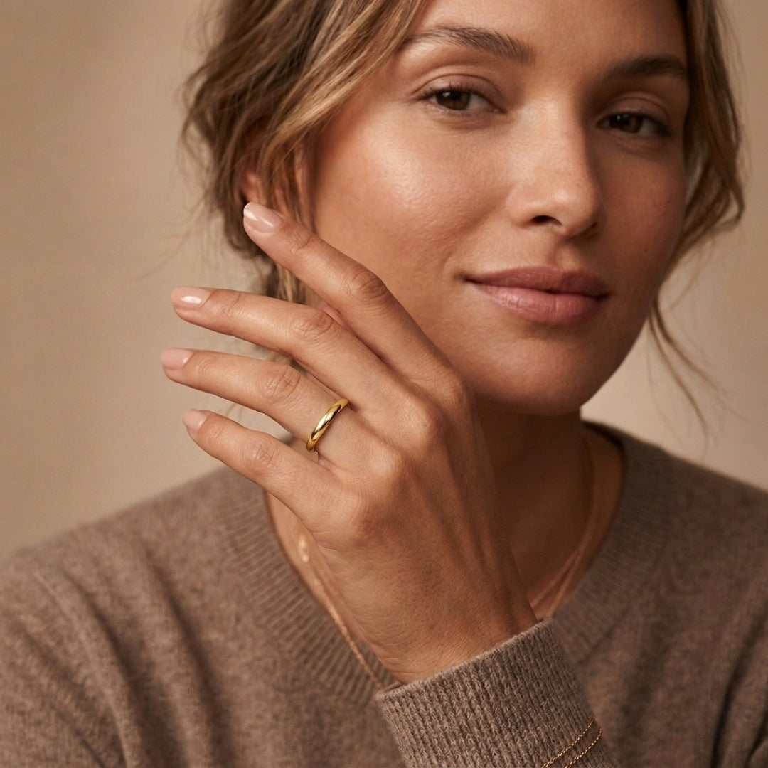 Model wearing a 3mm 14K yellow gold comfort fit wedding band - AJ's Jewelry, Ridgewood NY