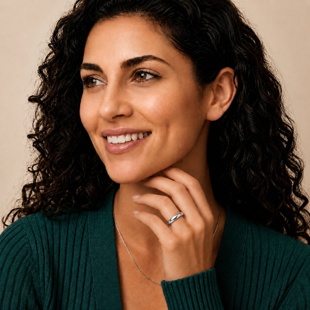 Model wearing a 4mm sterling silver comfort fit wedding band - AJ's Jewelry, Ridgewood NY