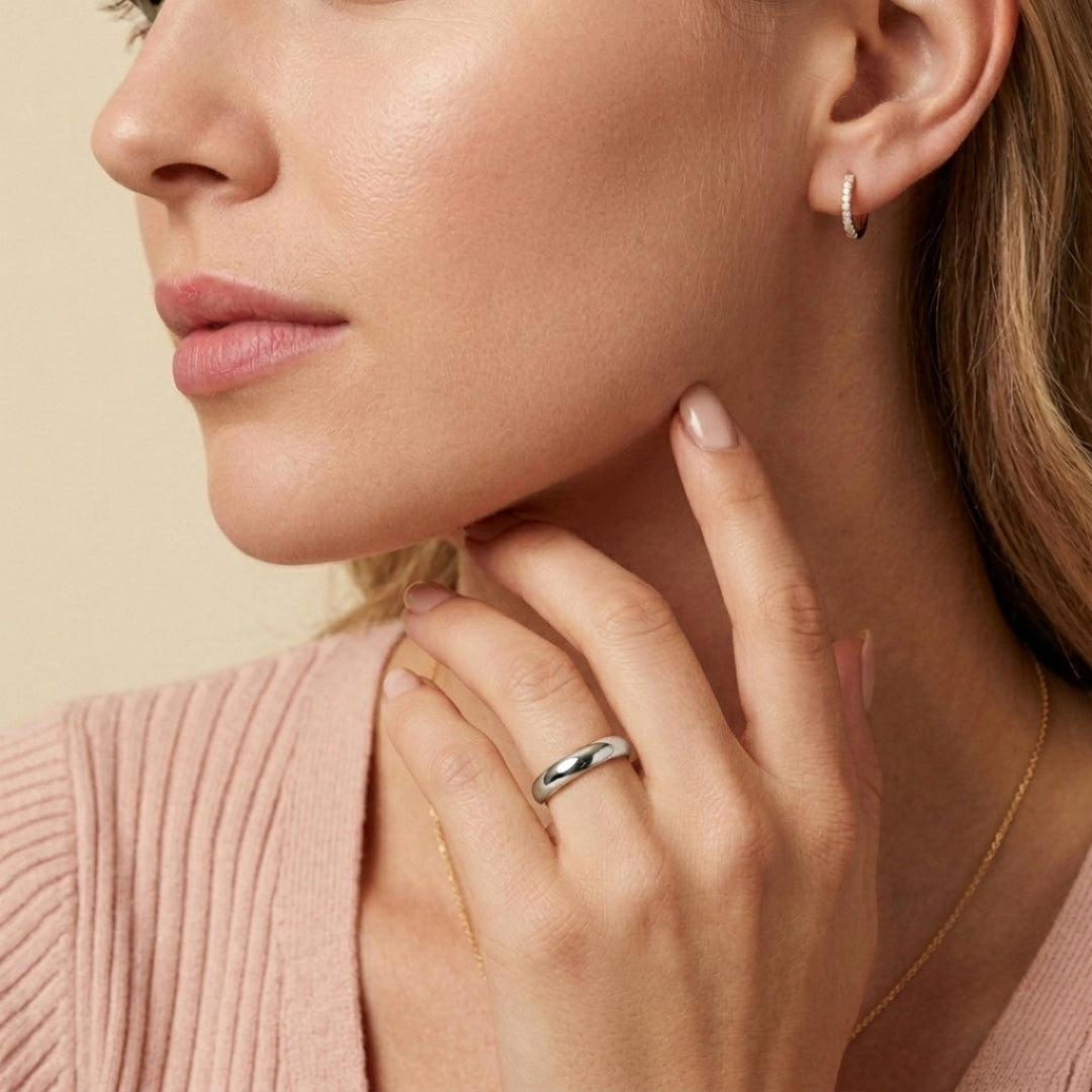 5mm sterling silver comfort fit wedding band worn on a model's hand, close-up view - AJ's Jewelry, Ridgewood NY