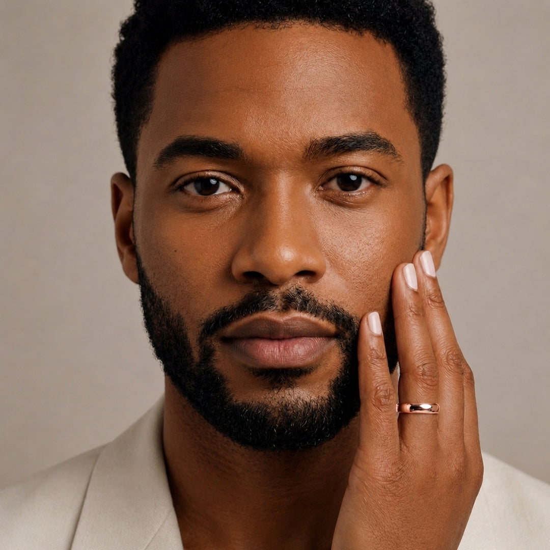A model wearing the 5mm Slim Half Round Wedding Band in Rose Gold