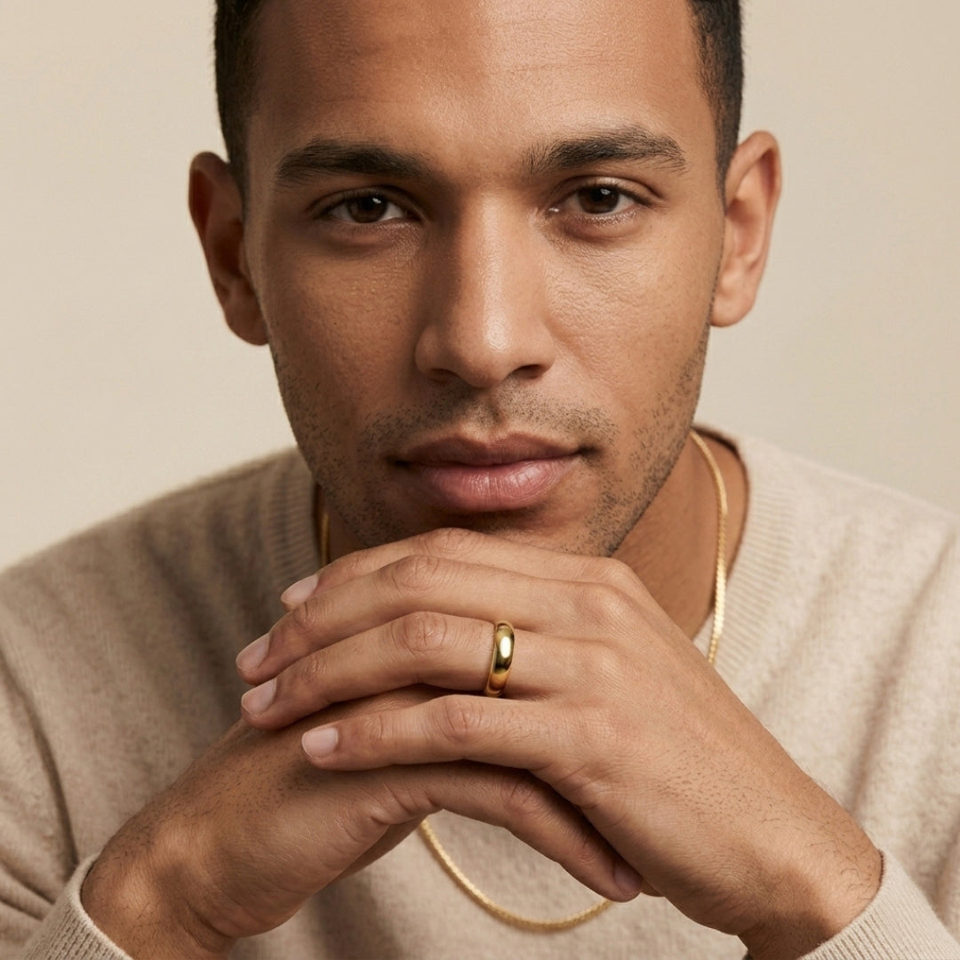 Model wearing a 6mm 14K yellow gold comfort fit wedding band - AJ's Jewelry, Ridgewood NY