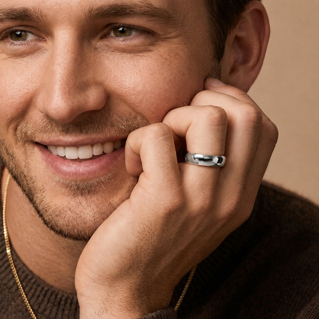 8mm sterling silver comfort fit wedding band worn on a model's hand, close-up view - AJ's Jewelry, Ridgewood NY