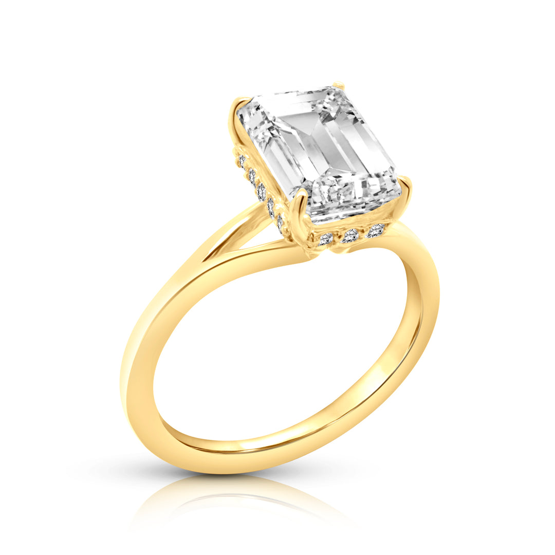 A image showing the final product of the 14 Karat Emerald Shape Hidden Halo Lab Grown Diamond Engagement Ring