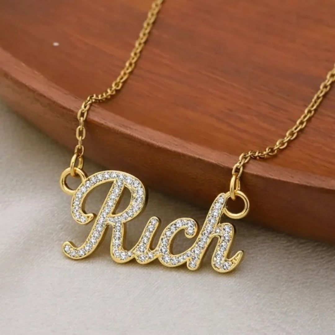 An image showing the final presentation of the Custom 14 Karat Yellow Gold Diamond Name Necklace