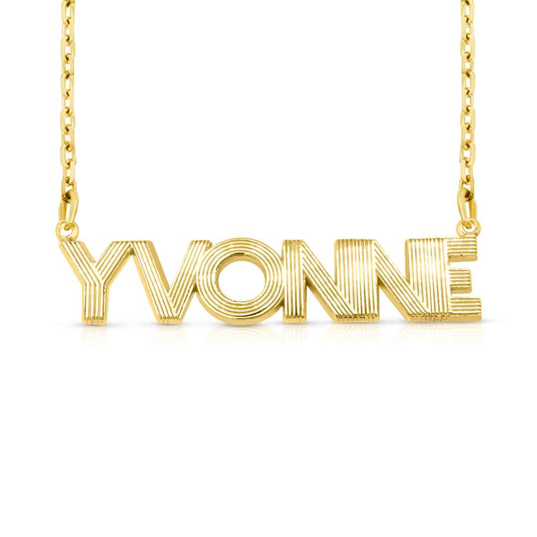 A sample of the nameplate with the name Yvonne in Yellow Gold