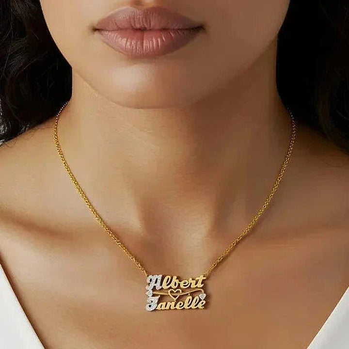 Model wearing the 14 Karat Two Name 3D Name Necklace in 14K yellow gold personalized with the name Albert | AJ's Jewelry