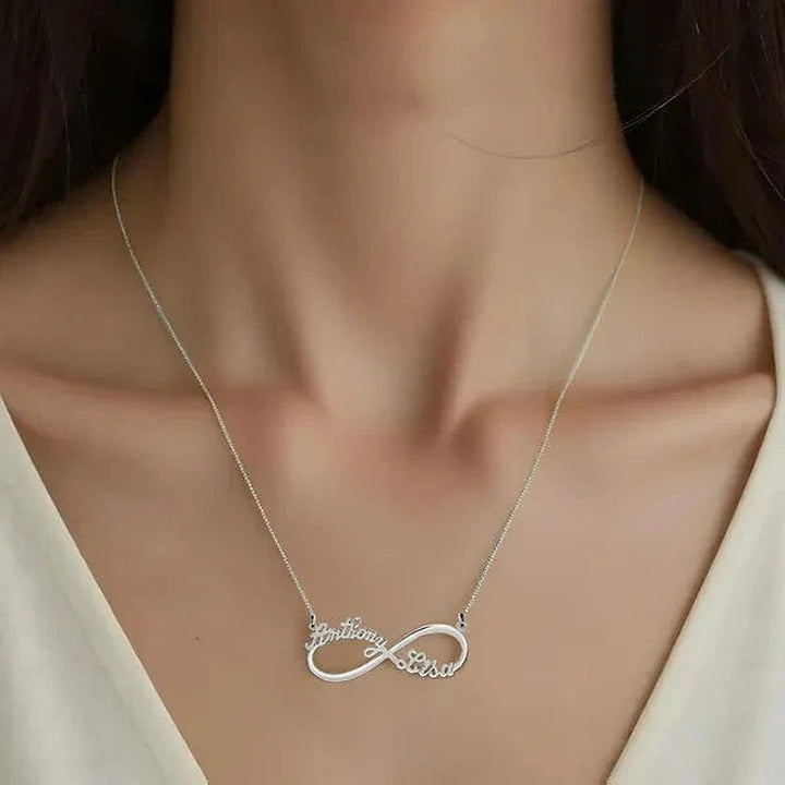 Model wearing the 14 Karat Two Name Infinity Name Necklace in 14K white gold personalized with the name Anthony | AJ's Jewelry