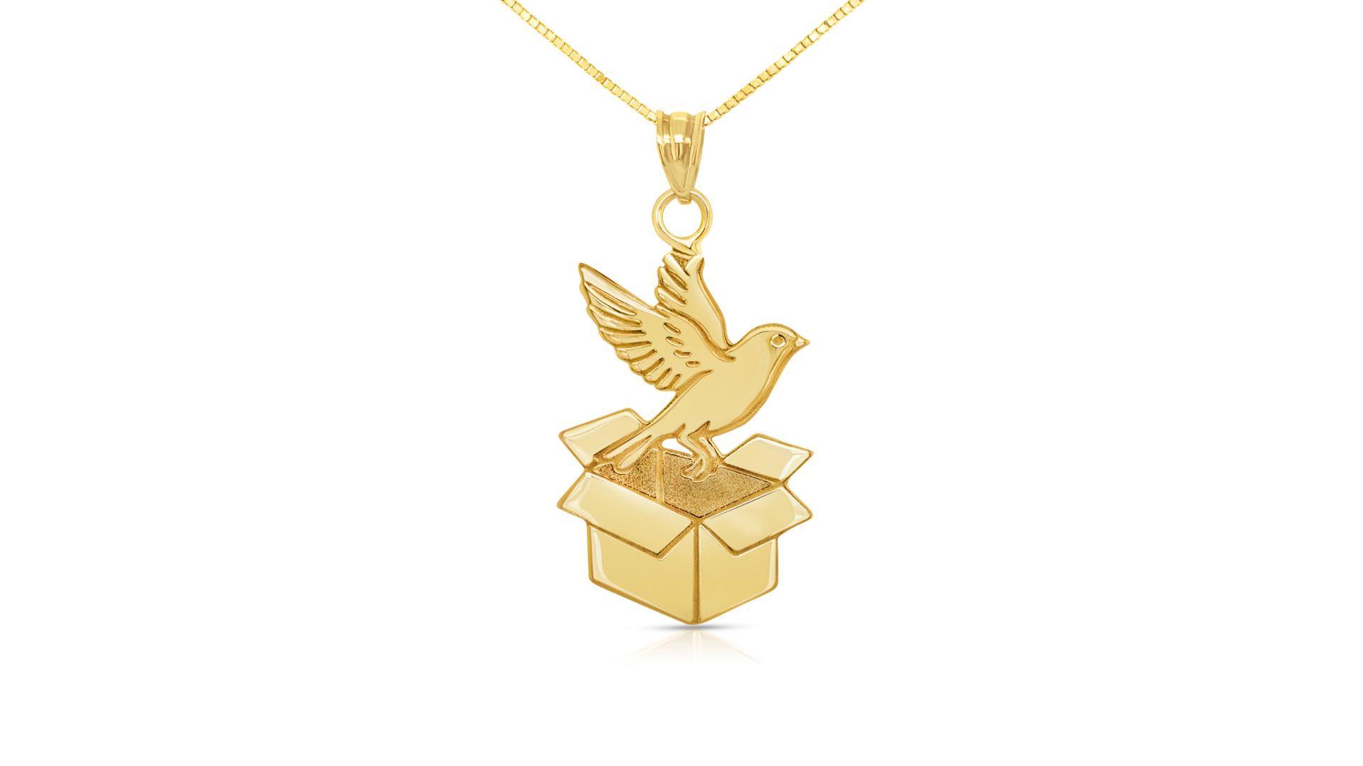 An image showing the final product of the 14 Karat Yellow Gold Bird Coming Out of a Box Pendant