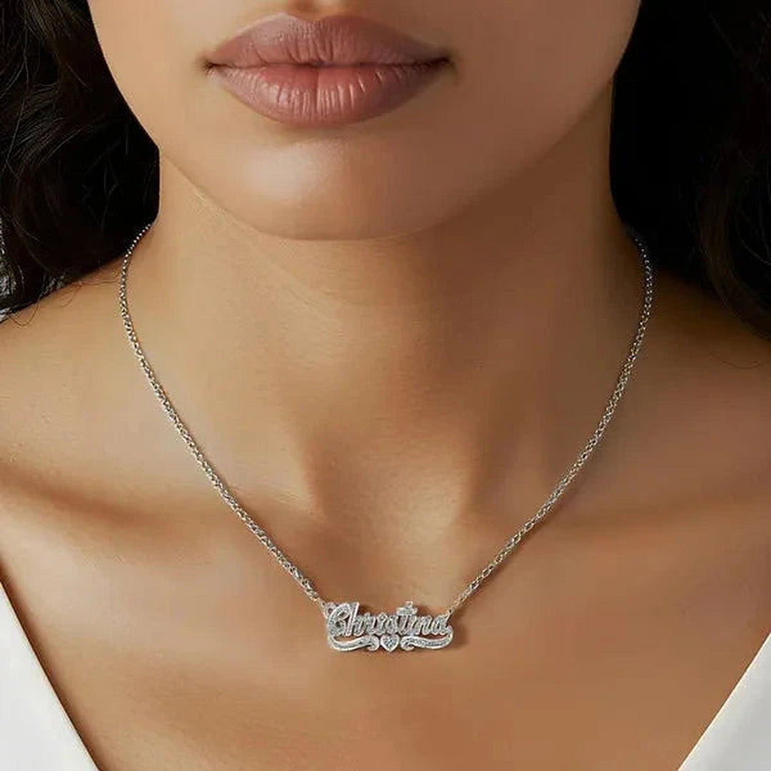 Model wearing the 14 Karat Diamond Cut 3D Name Necklace with One Heart in 14K white gold, name Christina | AJ's Jewelry