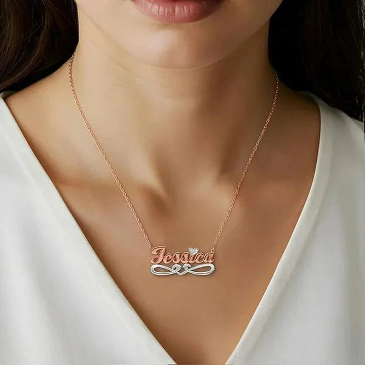 Model wearing the 14 Karat Bold Script Name Necklace with Tail in 14K rose gold personalized with the name Jessica | AJ's Jewelry