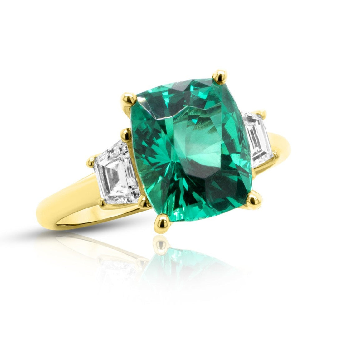 Angle view of the completed lab grown emerald 3-stone engagement ring with matching wedding band — AJ's Jewelry Ridgewood Queens NY