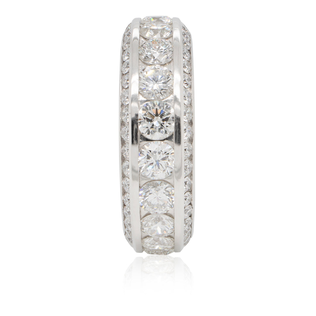 Finished platinum natural diamond eternity band side profile showing the beveled edge architecture — AJ's Jewelry Queens NY