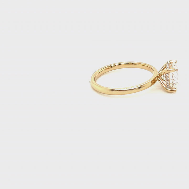 Rotating video of the 14 Karat Gold 2ct round lab grown diamond hidden halo engagement ring at AJ's Jewelry in Queens, NY