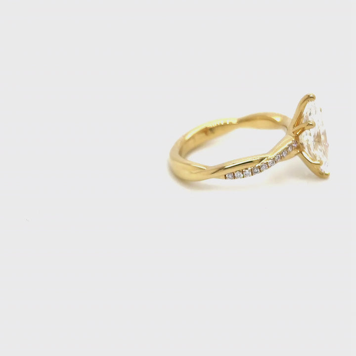 Rotating video of the 18 Karat Gold 1.5ct marquise twist lab grown diamond engagement ring at AJ's Jewelry in Queens, NY