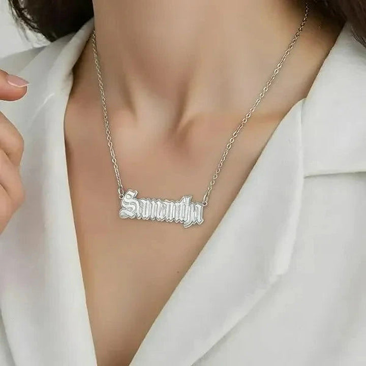 Model wearing the Sterling Silver Gothic Style Name Necklace personalized with the name Samantha | AJ's Jewelry