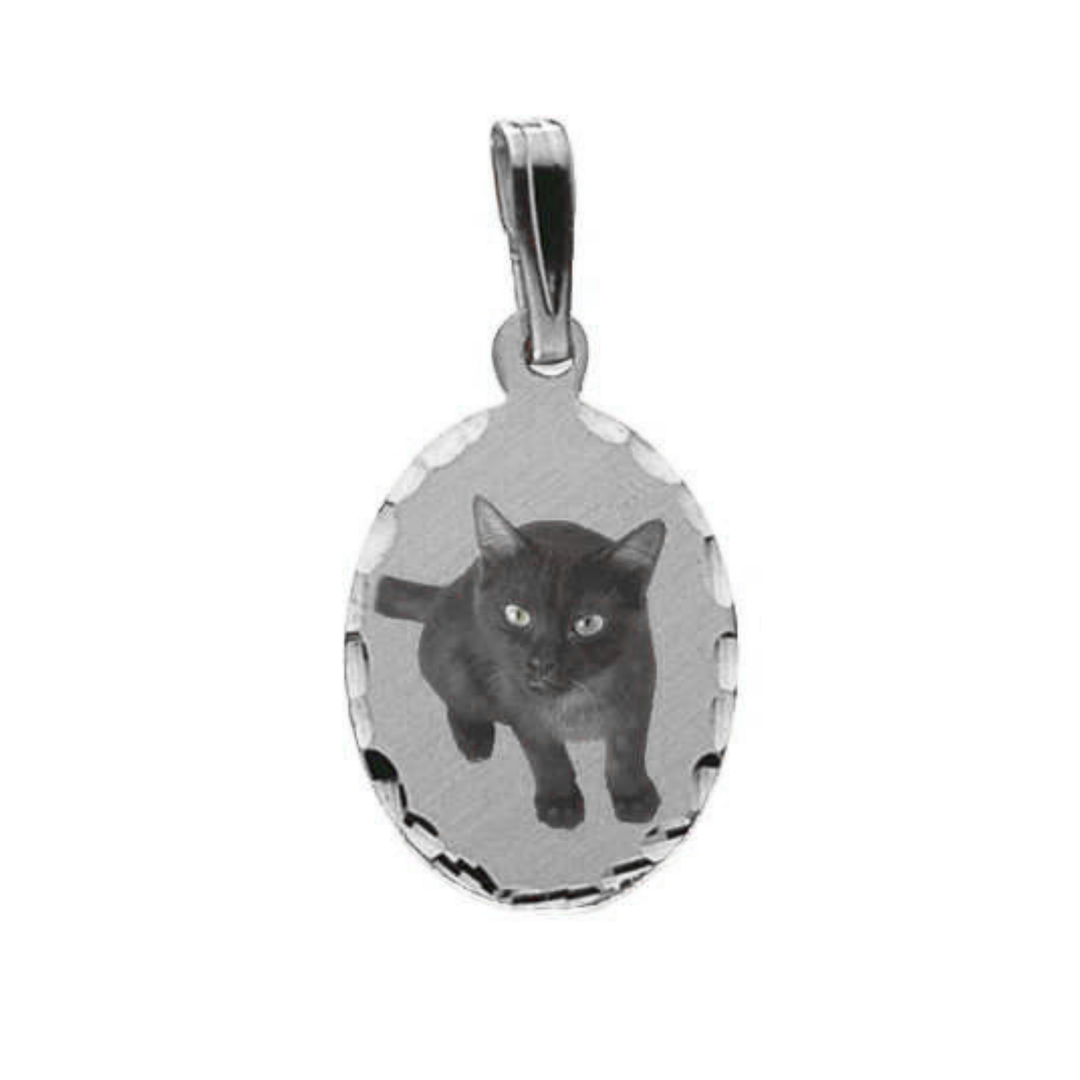 A silver oval pendant charm featuring a picture black cat, shown on a plain white background.