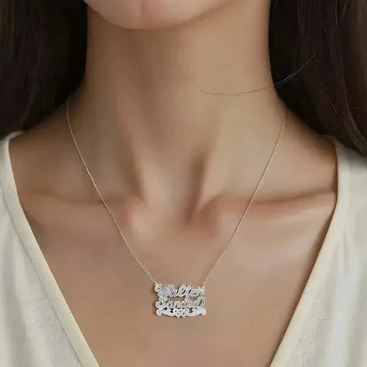 Model wearing the 14 Karat Two Name 3D Name Necklace with Intertwined Hearts in 14K white gold, name Walter | AJ's Jewelry